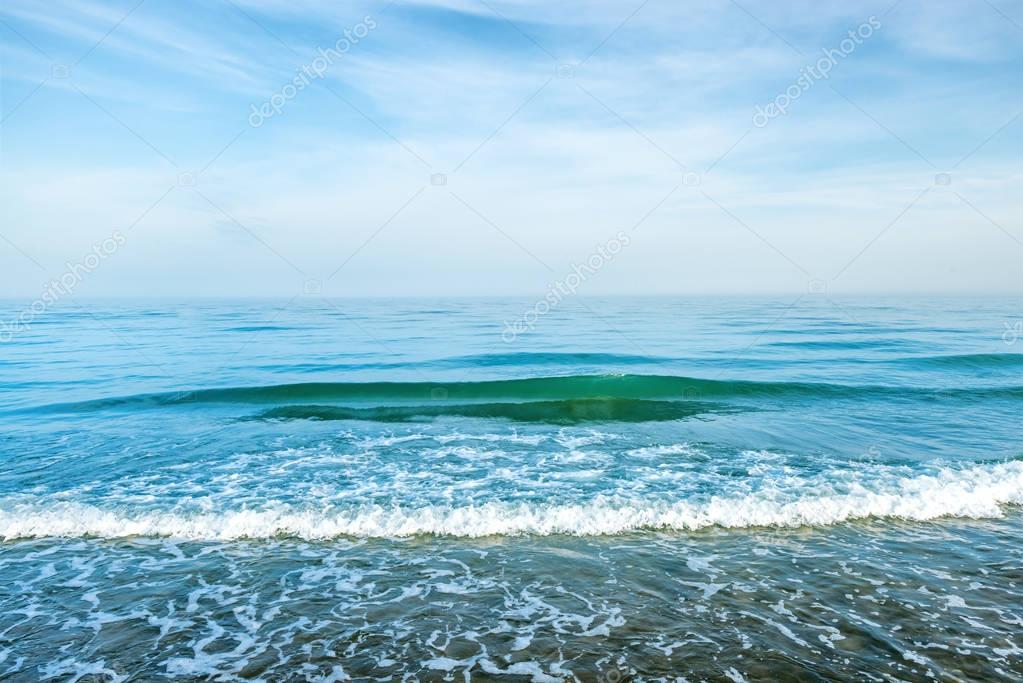 depositphotos_156133898-stock-photo-blue-sea-water-with-waves